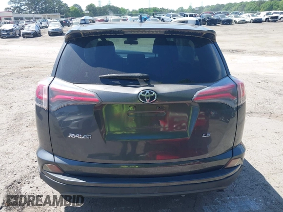 2016 Toyota RAV4 LE with VIN JTMZFREV7GJ086149, listed as a IAAI auction lot 42064251 with 90,104 mi miles and . Bid and sale history available at DreamBid. Image 16.