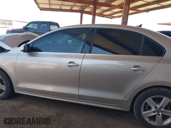 2014 Volkswagen Jetta TDI w/Premium with VIN 3VWLL7AJ1EM228062, listed as a IAAI auction lot 42256650 with 218,955 mi miles and . Bid and sale history available at DreamBid. Image 14.