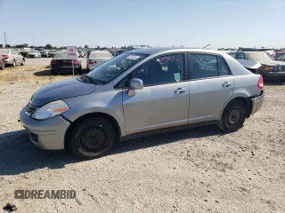 2011 Nissan Versa S with VIN 3N1BC1AP7BL442848, listed as a Copart auction lot 65176455 with 194,300 mi miles and Salvage title. Bid and sale history available at DreamBid. Image 1.