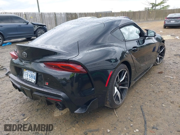 2022 Toyota Supra 3.0 with VIN WZ1DB0C01NW051973, listed as a IAAI auction lot 42030614 with Not Provided miles and . Bid and sale history available at DreamBid. Image 4.