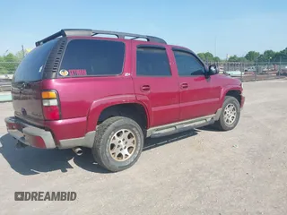 2004 Chevrolet Tahoe LS with VIN 1GNEK13Z94R252144, listed as a IAAI auction lot 42154641 with 201,247 mi miles. Bid and sale history available at carsss.com. Image 4.