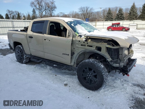 2021 GMC Canyon 4WD AT4 w/Leather with VIN 1GTG6FEN8M1279301, listed as a Copart auction lot 89373145 with 34,035 mi miles and Salvage Title. Bid and sale history available at carsss.com. Image 4.