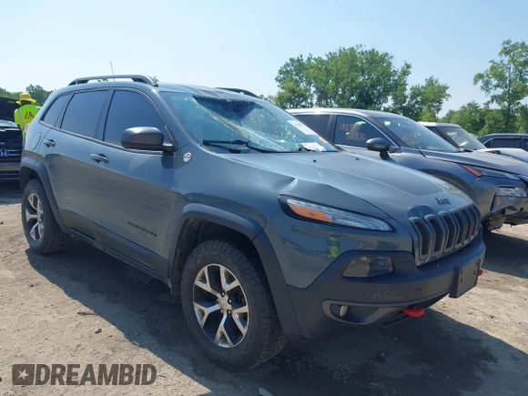 2014 Jeep Cherokee Trailhawk z VIN 1C4PJMBSXEW273520, wystawiony jako IAAI lot #42569063 z przebiegiem 137 585 mil mil oraz . Historia ofert i sprzedaży dostępna na DreamBid. Obrazek 1.