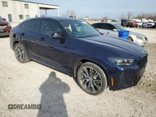 2023 BMW X4 M40i with VIN 5UX43DT06P9R01258, listed as a Copart auction lot 41738674 with 8,184 mi miles and Salvage Title. Bid and sale history available at carsss.com. Image 4.