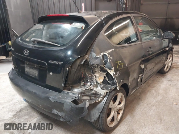 2007 Hyundai Accent SE with VIN KMHCN36C67U026540, listed as a IAAI auction lot 41062633 with 70,143 mi miles. Bid and sale history available at carsss.com. Image 4.