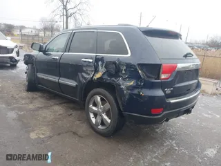 2012 Jeep Grand Cherokee Overland with VIN 1C4RJFCT9CC182216, listed as a IAAI auction lot 41490446 with 153,237 mi miles. Bid and sale history available at carsss.com. Image 3.