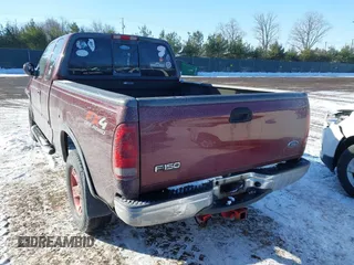 2003 Ford F-150 XL with VIN 1FTRX18L33NB00026, listed as a IAAI auction lot 41608554 with 161,877 mi miles. Bid and sale history available at carsss.com. Image 3.