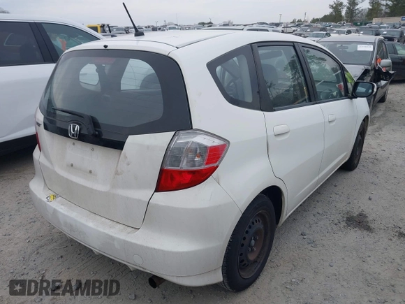 2013 Honda Fit with VIN JHMGE8H30DC067178, listed as a IAAI auction lot 41498926 with 121,036 mi miles. Bid and sale history available at carsss.com. Image 4.