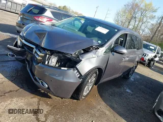 2015 Honda Odyssey Touring Elite z VIN 5FNRL5H9XFB067679, wystawiony jako IAAI lot #41913306 z przebiegiem 199 482 mil mil oraz . Historia ofert i sprzedaży dostępna na DreamBid. Obrazek 2.