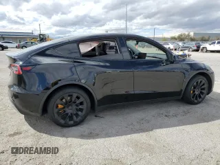 2021 Tesla Model Y Long Range with VIN 5YJYGDEEXMF188737, listed as a Copart auction lot 49117605 with 49,201 mi miles and Salvage Title. Bid and sale history available at DreamBid. Image 3.