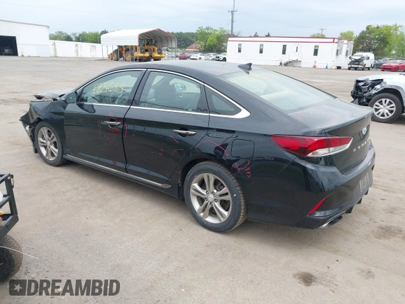 2018 Hyundai Sonata Sport with VIN 5NPE34AF0JH710477, listed as a IAAI auction lot 42104684 with 158,260 mi miles and . Bid and sale history available at carsss.com. Image 3.