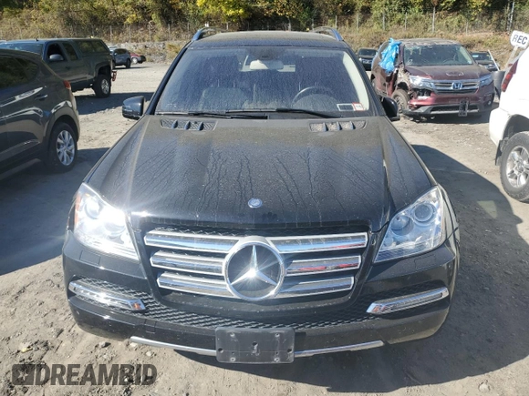 2011 Mercedes-Benz GL-Class GL 550 with VIN 4JGBF8GE2BA696439, listed as a Copart auction lot 74685374 with 56,766 mi miles and Salvage Title. Bid and sale history available at carsss.com. Image 5.