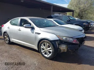 2013 Kia Optima EX with VIN 5XXGN4A77DG173344, listed as a IAAI auction lot 41830904 with 174,655 mi miles. Bid and sale history available at carsss.com. Image 1.
