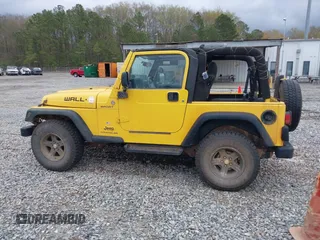 2006 Jeep Wrangler Sport z VIN 1J4FA49S06P700436, wystawiony jako IAAI lot #41866190 z przebiegiem 191 655 mil mil oraz . Historia ofert i sprzedaży dostępna na DreamBid. Obrazek 14.