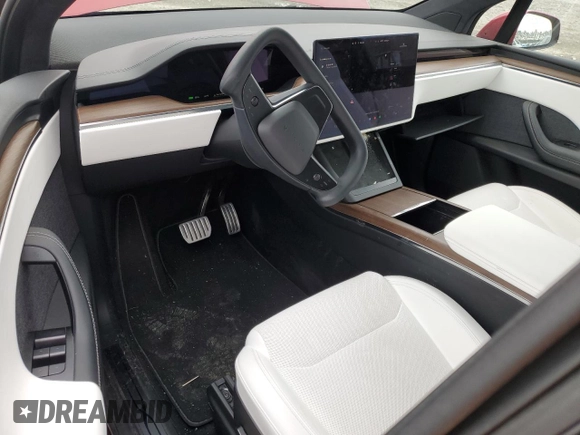 2023 Tesla Model X with VIN 7SAXCAE51PF390573, listed as a Copart auction lot 47499385 with Not Provided miles and Salvage Title. Bid and sale history available at DreamBid. Image 8.
