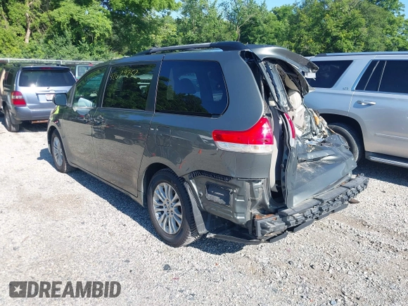 2011 Toyota Sienna XLE AAS with VIN 5TDYK3DC4BS136568, listed as a IAAI auction lot 42639252 with 239,020 mi miles and . Bid and sale history available at DreamBid. Image 3.