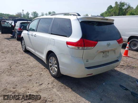 2014 Toyota Sienna Limited with VIN 5TDDK3DC0ES091826, listed as a IAAI auction lot 42112113 with 200,255 mi miles and . Bid and sale history available at DreamBid. Image 3.
