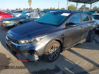 2023 Kia Forte GT-Line with VIN 3KPF54AD4PE529859, listed as a IAAI auction lot 41949900 with 25,908 mi miles. Bid and sale history available at carsss.com. Image 2.