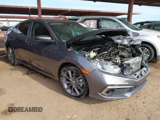 2020 Honda Civic Sedan EX-L with VIN 19XFC1F74LE009078, listed as a IAAI auction lot 41403928 with Not Provided miles. Bid and sale history available at carsss.com. Image 1.