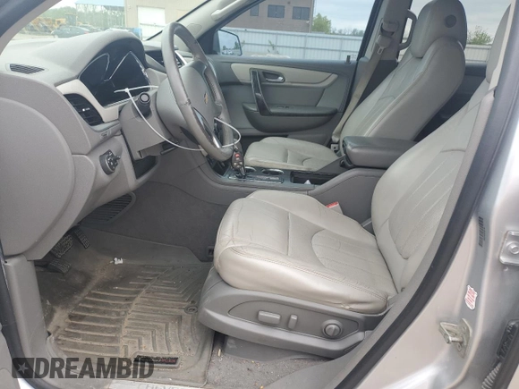 2014 Chevrolet Traverse LTZ z VIN 1GNKVJKD6EJ253350, wystawiony jako Copart lot #54688345 z przebiegiem 230 479 mil mil oraz Szkoda całkowita • Salvage title. Historia ofert i sprzedaży dostępna na DreamBid. Obrazek 7.