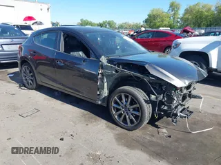 2018 Mazda 3 Touring with VIN 3MZBN1L34JM164952, listed as a IAAI auction lot 42179420 with 106,706 mi miles and . Bid and sale history available at DreamBid. Image 1.