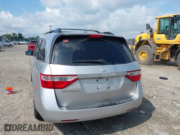 2012 Honda Odyssey EX-L with VIN 5FNRL5H61CB081634, listed as a IAAI auction lot 42760909 with 197,949 mi miles and . Bid and sale history available at DreamBid. Image 18.