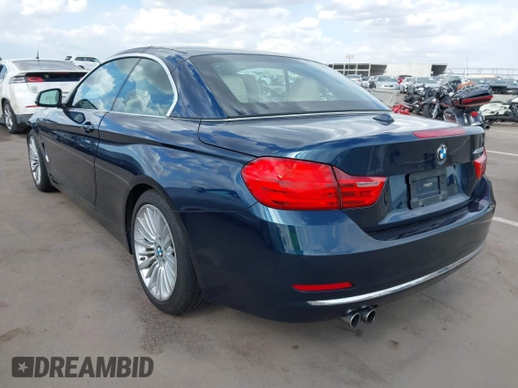 2014 BMW 4 Series 428i with VIN WBA3V5C52EJ968893, listed as a IAAI auction lot 41955531 with 91,090 mi miles and . Bid and sale history available at DreamBid. Image 3.