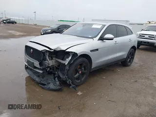 2020 Jaguar F-Pace 25t Premium z VIN SADCJ2FX2LA620720, wystawiony jako IAAI lot #41704850 z przebiegiem 57 113 mil mil oraz . Historia ofert i sprzedaży dostępna na DreamBid. Obrazek 18.