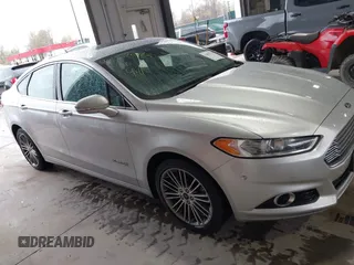 2013 Ford Fusion SE Hybrid with VIN 3FA6P0LU2DR319335, listed as a IAAI auction lot 42007573 with 135,099 mi miles. Bid and sale history available at carsss.com. Image 13.