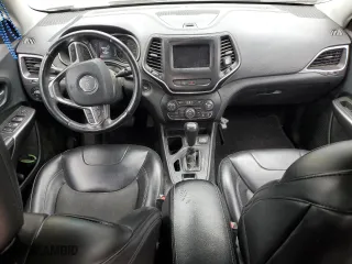 2019 Jeep Cherokee Latitude Plus with VIN 1C4PJLLB0KD226030, listed as a Copart auction lot 49159015 with 105,978 mi miles and Salvage Title. Bid and sale history available at carsss.com. Image 8.