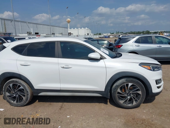 2019 Hyundai Tucson Sport with VIN KM8J33AL1KU861698, listed as a IAAI auction lot 42129173 with 100,160 mi miles. Bid and sale history available at carsss.com. Image 13.