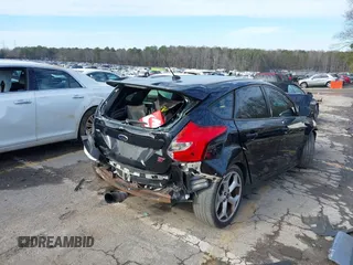 2014 Ford Focus ST with VIN 1FADP3L99EL147387, listed as a IAAI auction lot 41300582 with Not Provided miles and . Bid and sale history available at carsss.com. Image 4.