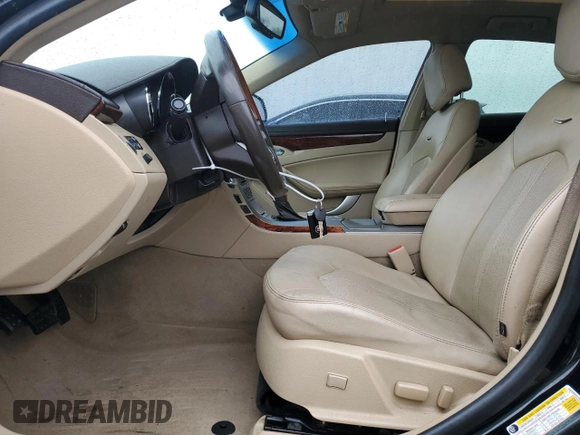 2012 Cadillac CTS Luxury with VIN 1G6DE5E5XC0106452, listed as a Copart auction lot 55658365 with 110,444 mi miles and Salvage Title. Bid and sale history available at DreamBid. Image 7.