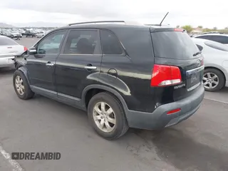 2012 Kia Sorento LX with VIN 5XYKT3A6XCG247528, listed as a IAAI auction lot 42194338 with 123,565 mi miles and . Bid and sale history available at carsss.com. Image 3.