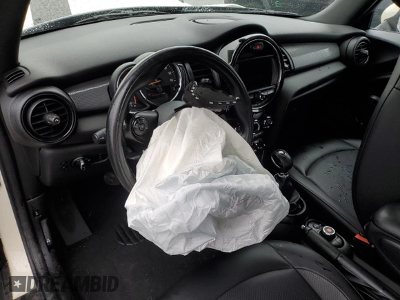 2019 MINI Convertible Cooper z VIN WMWWG5C54K3F79764, wystawiony jako Copart lot #48692085 z przebiegiem 94 211 mil mil oraz Szkoda całkowita • Salvage title. Historia ofert i sprzedaży dostępna na DreamBid. Obrazek 8.