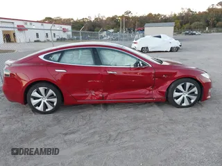 2020 Tesla Model S Long Range with VIN 5YJSA1E26LF390856, listed as a IAAI auction lot 41013728 with 54,985 mi miles. Bid and sale history available at carsss.com. Image 12.