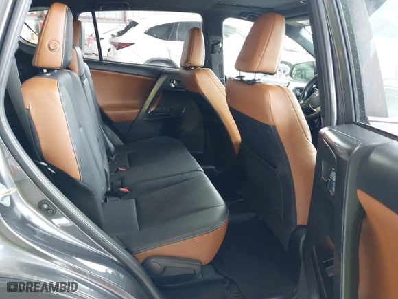 2016 Toyota RAV4 SE with VIN JTMJFREV7GJ072488, listed as a IAAI auction lot 42031254 with 106,901 mi miles. Bid and sale history available at carsss.com. Image 8.