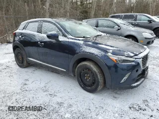 2018 Mazda CX-3 Grand Touring z VIN JM1DKFD73J0309811, wystawiony jako Copart lot #50003315 z przebiegiem 135 365 mil mil oraz Czysty tytuł • Clean title. Historia ofert i sprzedaży dostępna na DreamBid. Obrazek 4.