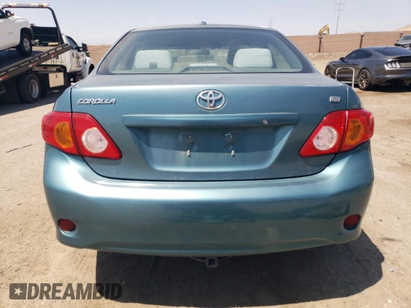2010 Toyota Corolla with VIN 2T1BU4EE8AC358186, listed as a Copart auction lot 60699135 with 158,972 mi miles and Salvage title. Bid and sale history available at DreamBid. Image 6.