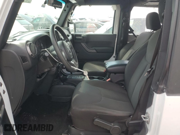 2017 Jeep Wrangler Sport z VIN 1C4AJWAG1HL556988, wystawiony jako Copart lot #52613315 z przebiegiem 60 955 mil mil oraz Szkoda całkowita • Salvage title. Historia ofert i sprzedaży dostępna na DreamBid. Obrazek 7.