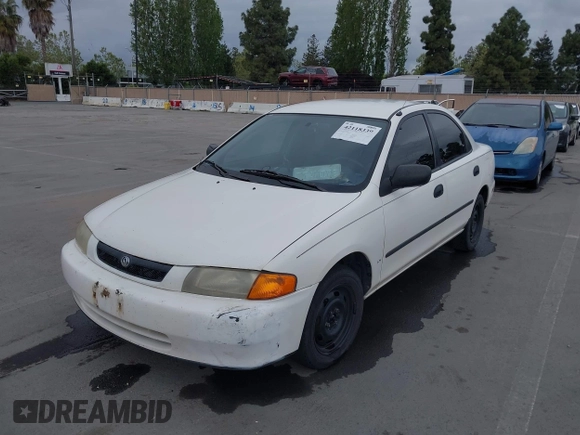 1997 Mazda Protege DX with VIN JM1BC1417V0156858, listed as a IAAI auction lot 42118339 with 187,673 mi miles and . Bid and sale history available at DreamBid. Image 6.
