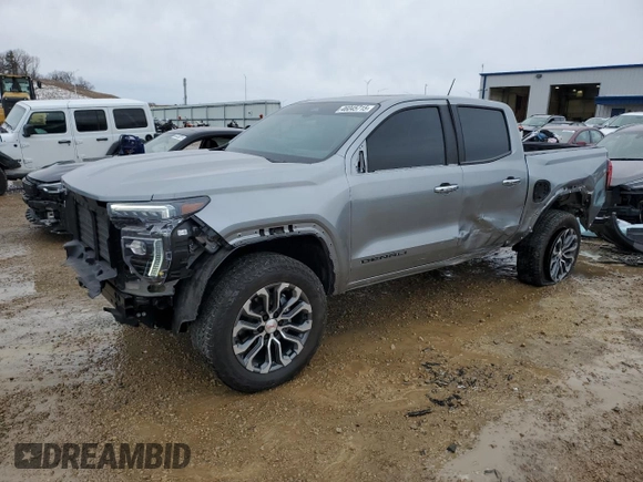 2023 GMC Canyon 4WD Denali with VIN 1GTP6FEK2P1176773, listed as a Copart auction lot 46045715 with 9,711 mi miles and Salvage Title. Bid and sale history available at carsss.com. Image 1.