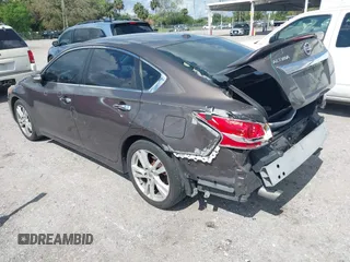 2013 Nissan Altima SV with VIN 1N4BL3AP7DC244977, listed as a IAAI auction lot 41656408 with 151,807 mi miles and . Bid and sale history available at DreamBid. Image 3.
