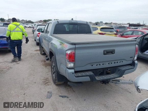 2021 Toyota Tacoma 4WD SR5 with VIN 3TMDZ5BN5MM116584, listed as a IAAI auction lot 41548175 with 23,031 mi miles. Bid and sale history available at carsss.com. Image 3.