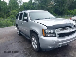 2011 Chevrolet Tahoe LT with VIN 1GNSKBE08BR123400, listed as a IAAI auction lot 42350852 with 281,486 mi miles and . Bid and sale history available at DreamBid. Image 1.