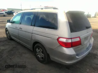 2006 Honda Odyssey EX-L with VIN 5FNRL38616B413712, listed as a IAAI auction lot 39878116 with 228,623 mi miles. Bid and sale history available at carsss.com. Image 3.
