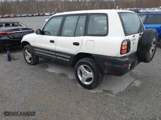 1999 Toyota RAV4 with VIN JT3HP10VXX7115145, listed as a IAAI auction lot 41853011 with 211,121 mi miles. Bid and sale history available at carsss.com. Image 3.