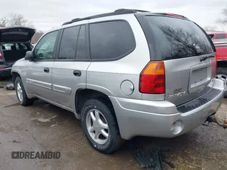 2005 GMC Envoy SLE with VIN 1GKDT13S552332088, listed as a IAAI auction lot 41699178 with 196,869 mi miles. Bid and sale history available at carsss.com. Image 3.