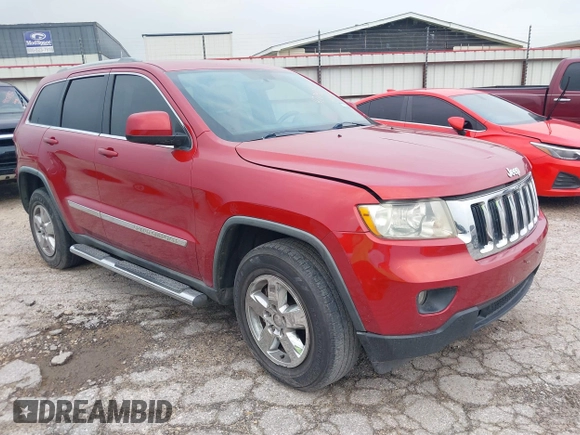 2011 Jeep Grand Cherokee Laredo with VIN 1J4RS4GG1BC673290, listed as a IAAI auction lot 42042557 with 147,590 mi miles and . Bid and sale history available at DreamBid. Image 1.