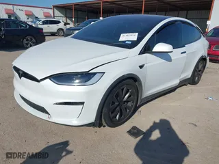 2023 Tesla Model X with VIN 7SAXCDE56PF424198, listed as a IAAI auction lot 41187814 with NaN miles. Bid and sale history available at carsss.com. Image 17.